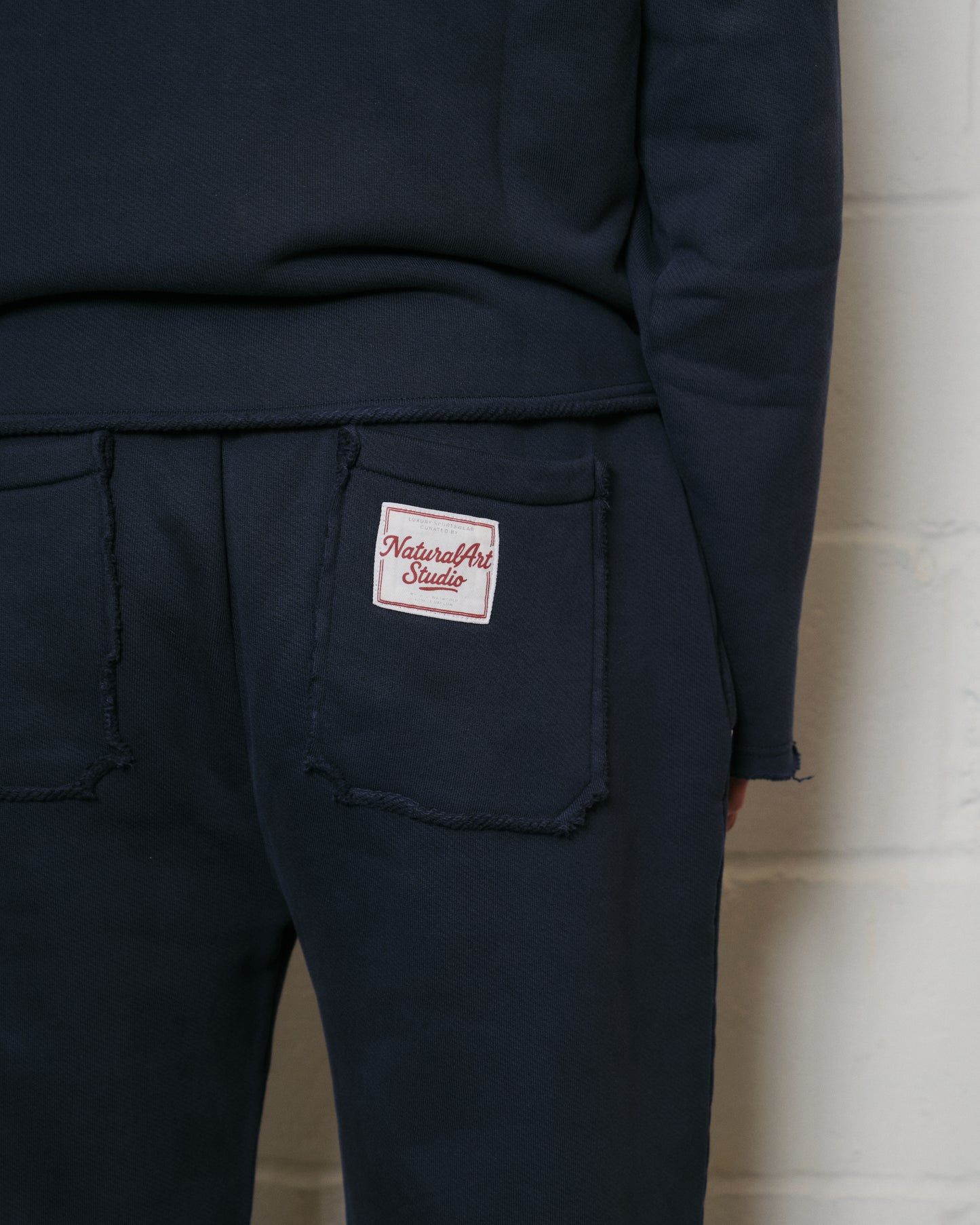 NAVY APPLIQUÉ SWEATPANTS